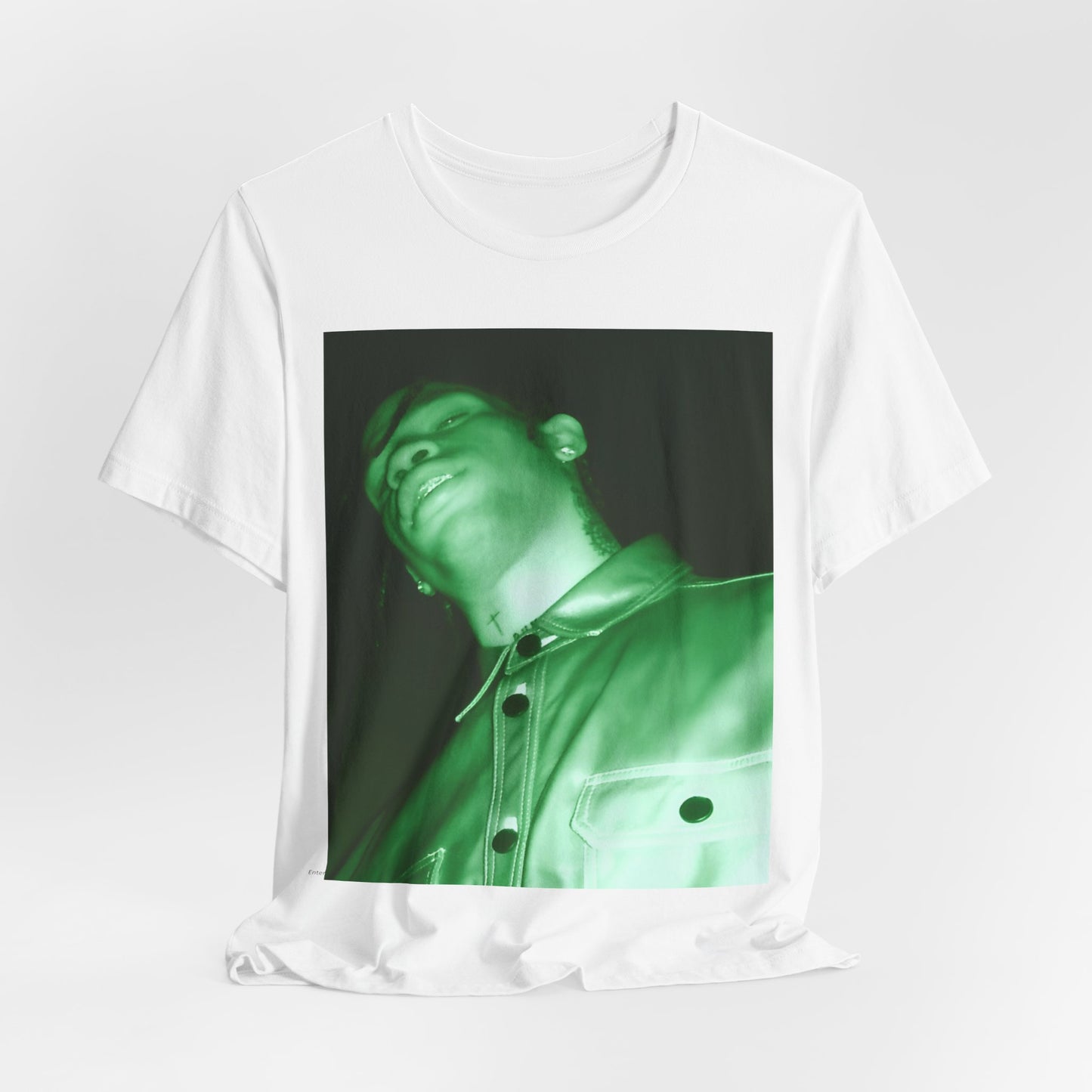 A black graphic t-shirt featuring a graphic of Travis Scott with psychedelic trap vibes.
