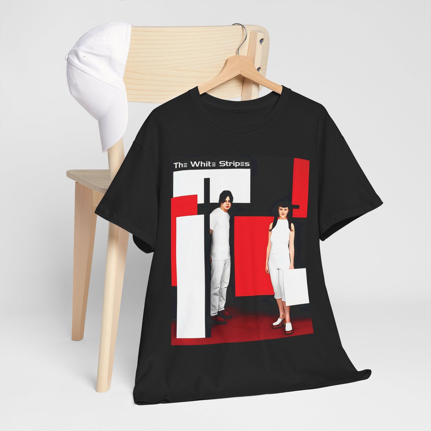 A black graphic t-shirt featuring an unapologetic raw rock graphic of The White Stripes.
