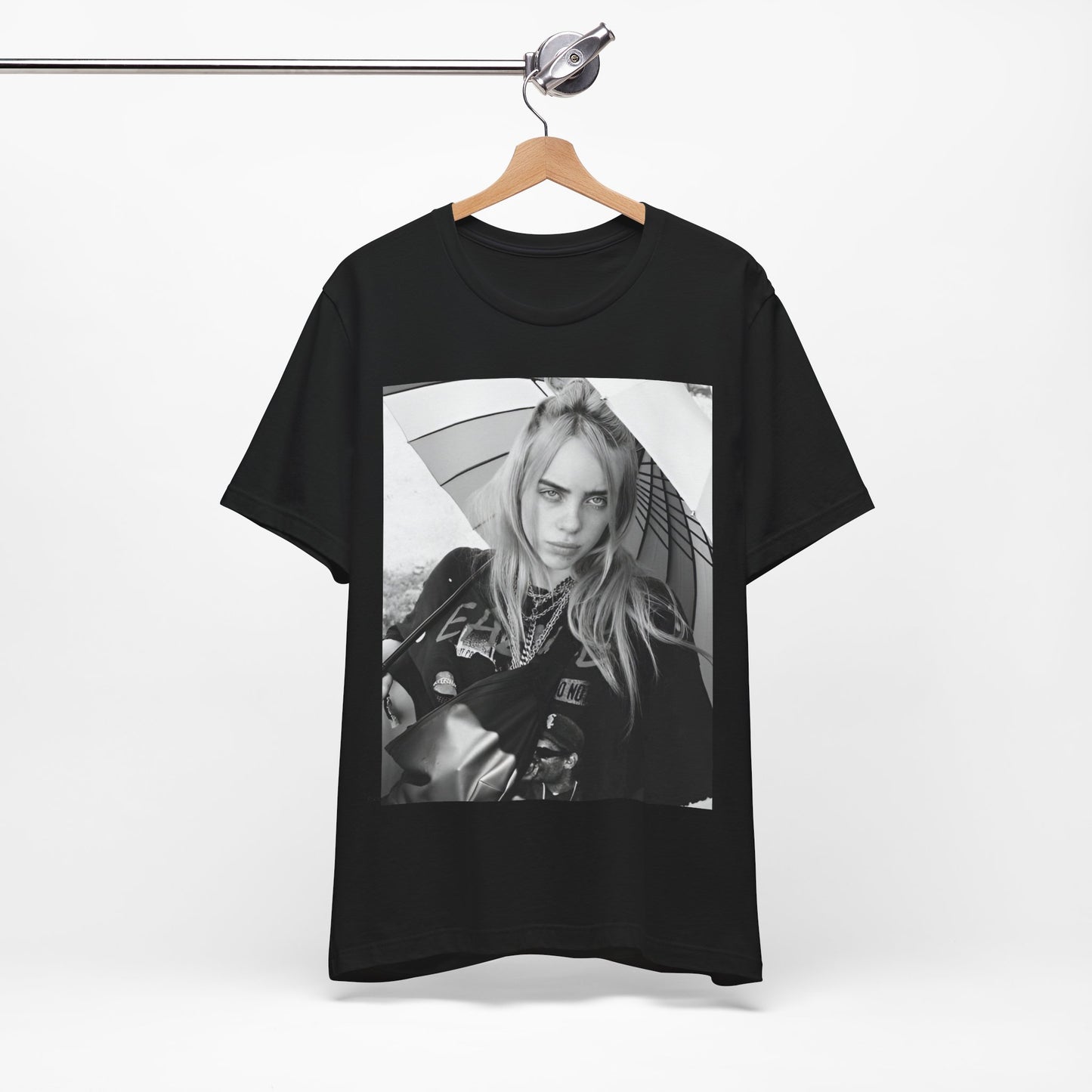A graphic t-shirt inspired by the colorful and iconic music video for "Bad Guy" by Billie Eilish.