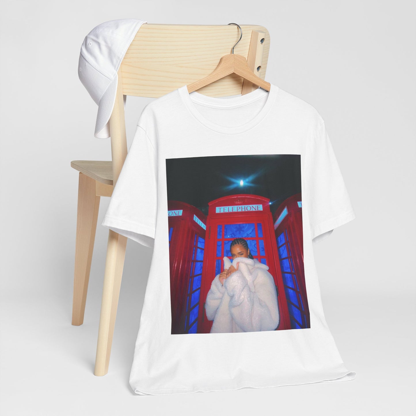 A black graphic t-shirt featuring a rhythmic dance pop graphic of Tyla.