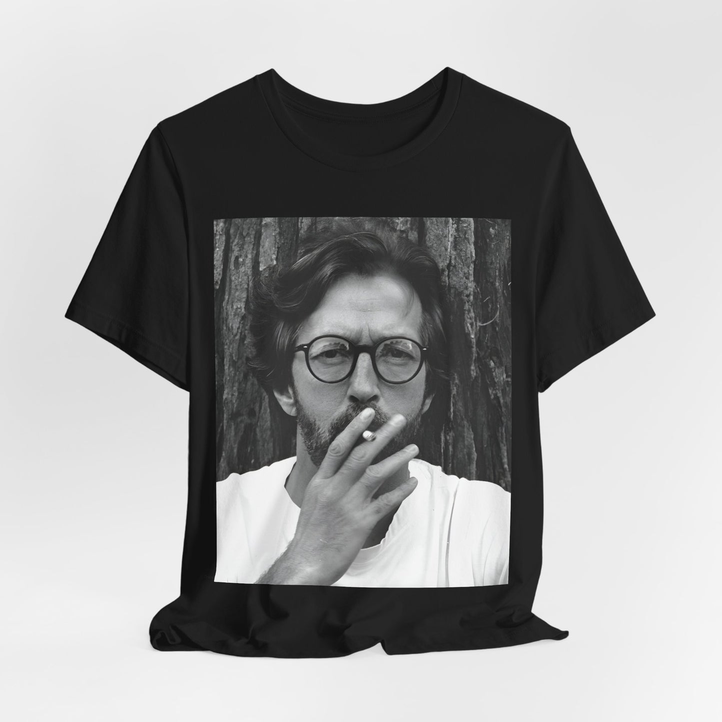 A black graphic t-shirt featuring a graphic related to Eric Clapton's classic Cream era.