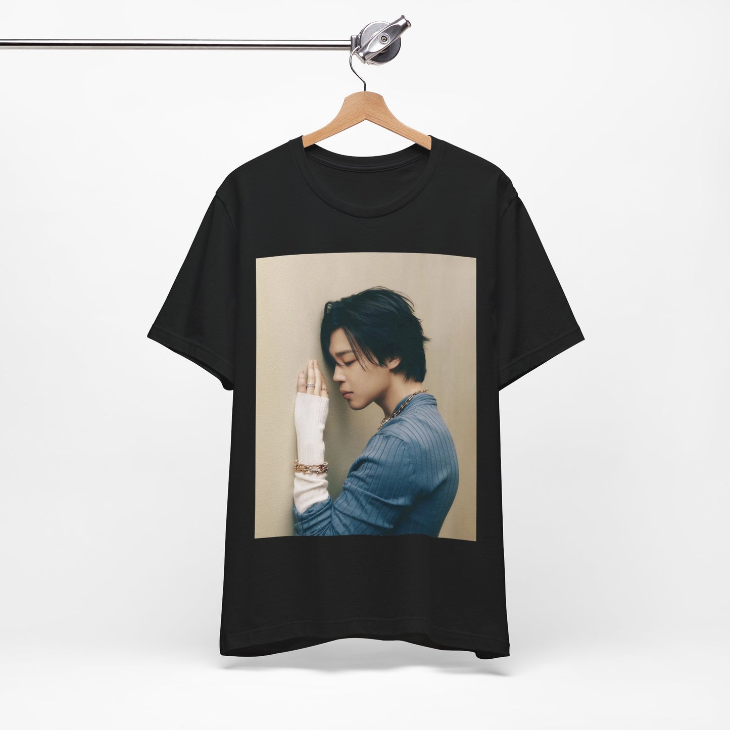 A black graphic t-shirt featuring a cool K-Pop idol essential graphic of Jimin.