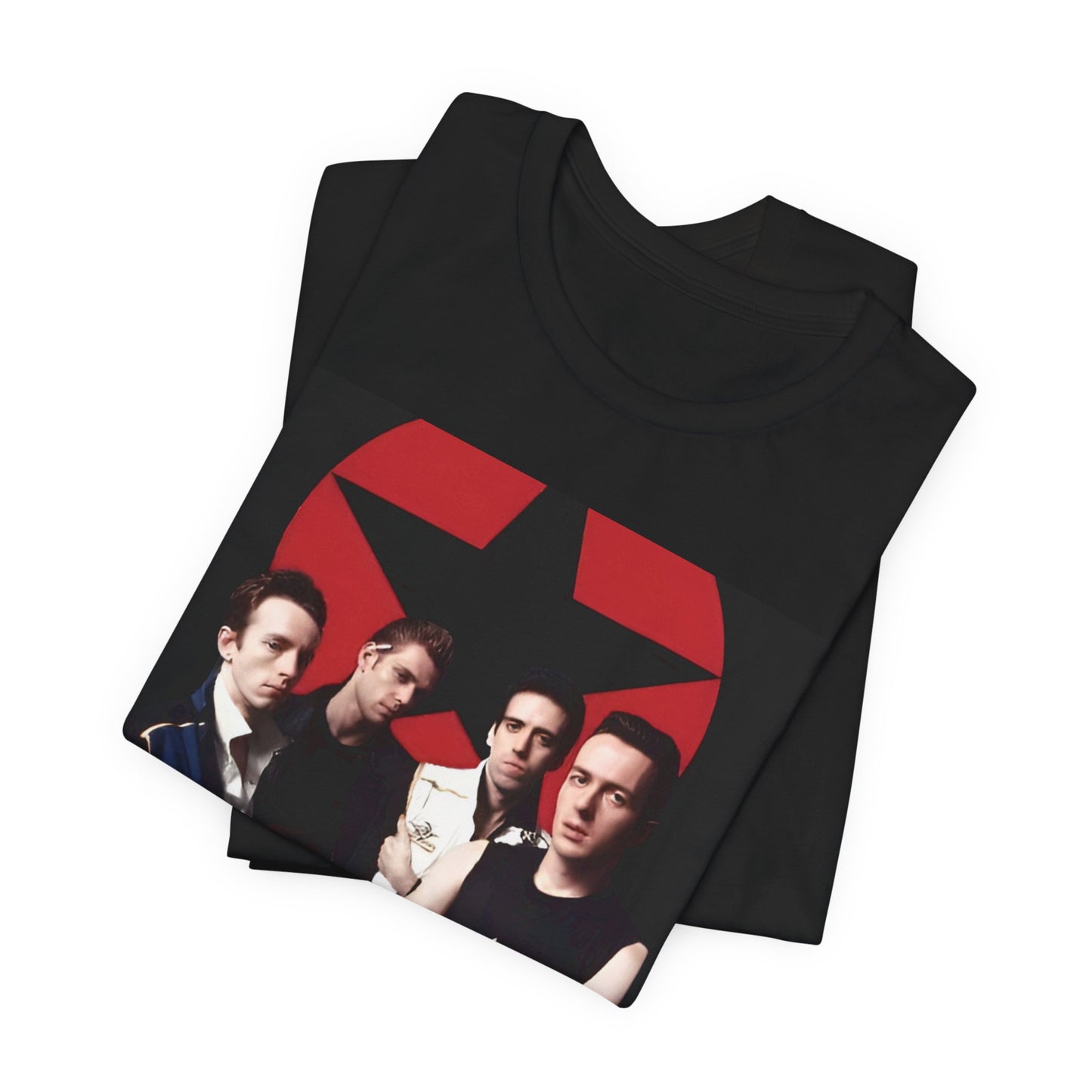 A black graphic t-shirt featuring a graphic related to The Clash's 'Should I Stay or Should I Go' song or era.
