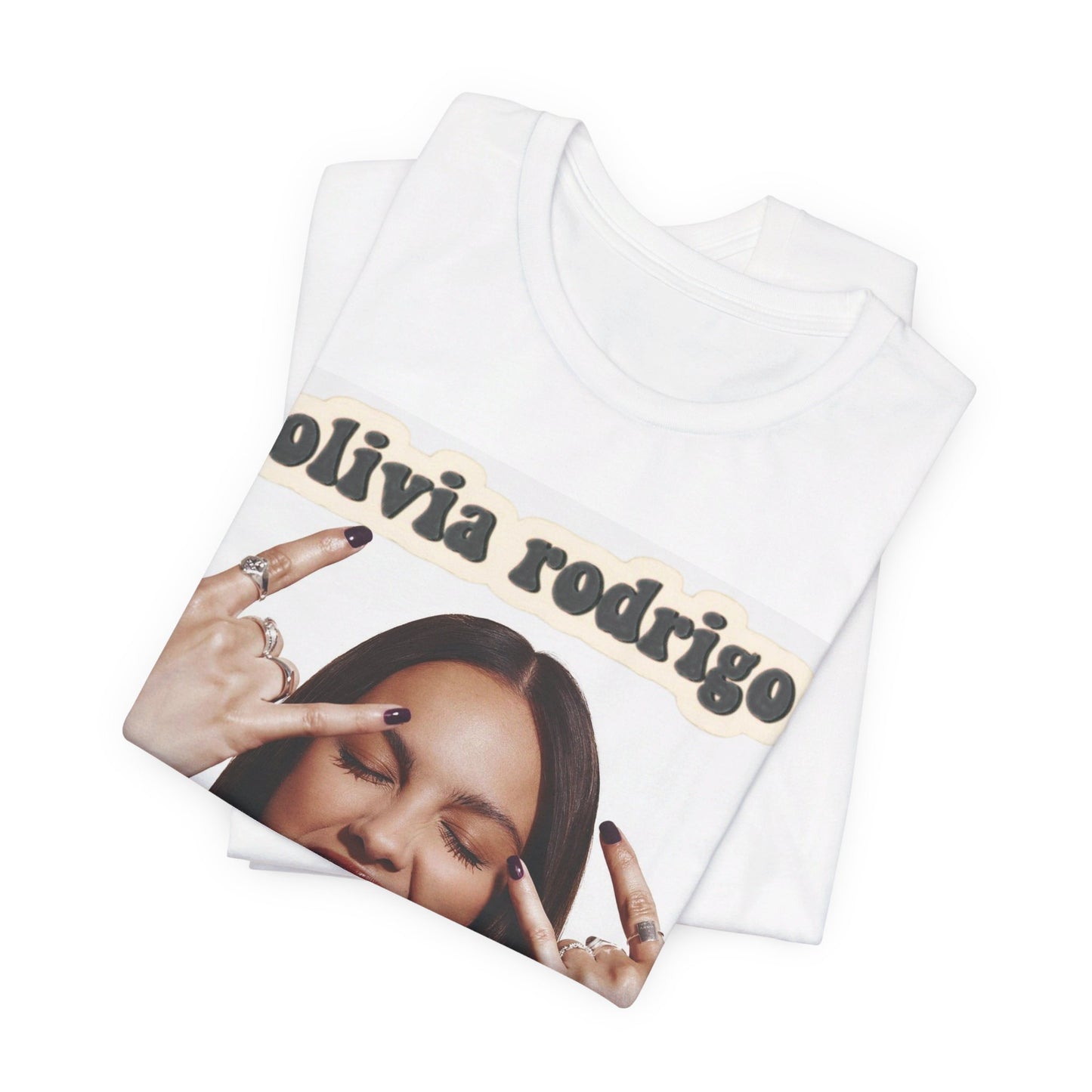 A black graphic t-shirt featuring a graphic related to Olivia Rodrigo's timeless pop anthems.