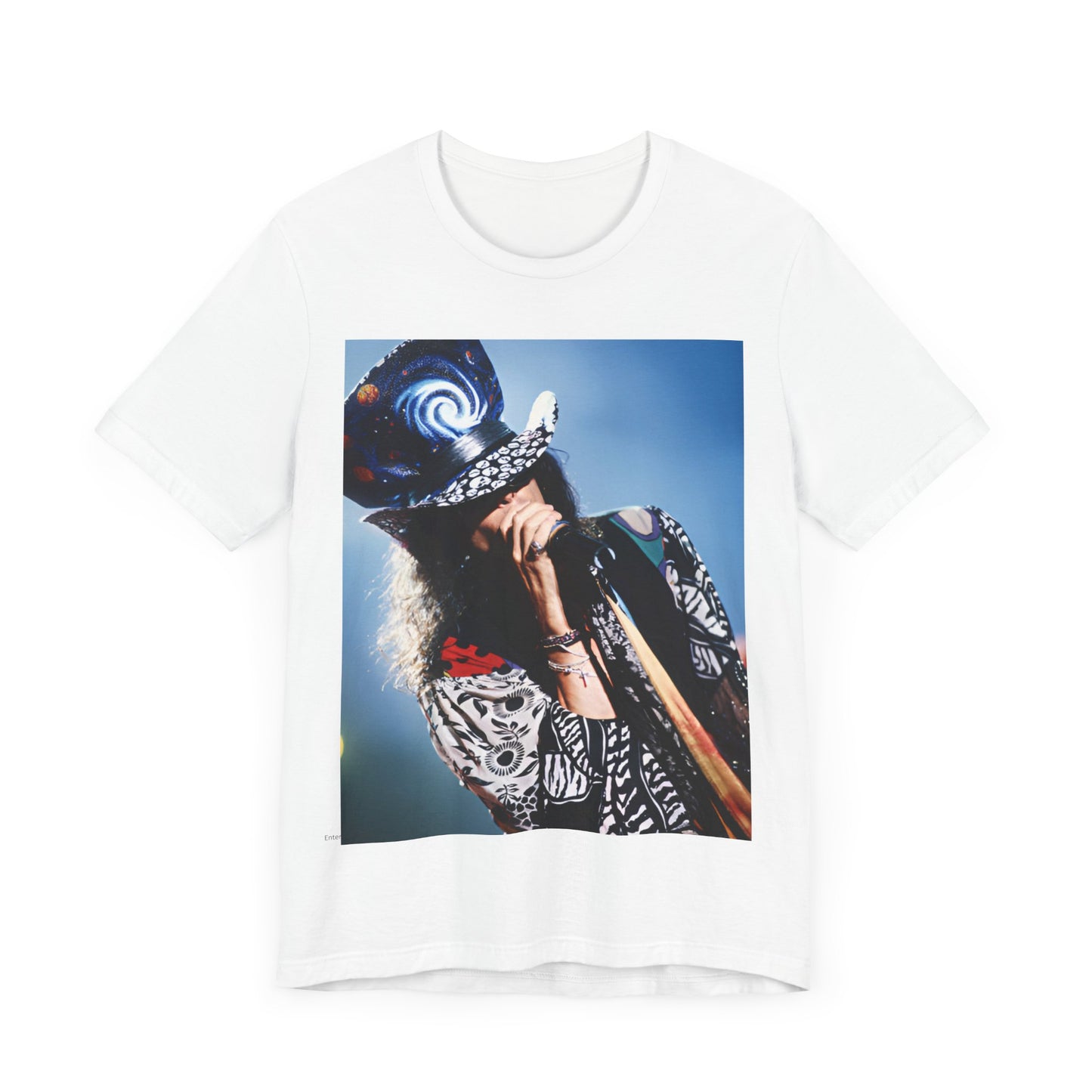 A black graphic t-shirt featuring a vintage 90s photo or illustration of Aerosmith performing live on stage, with band members in dynamic poses.
