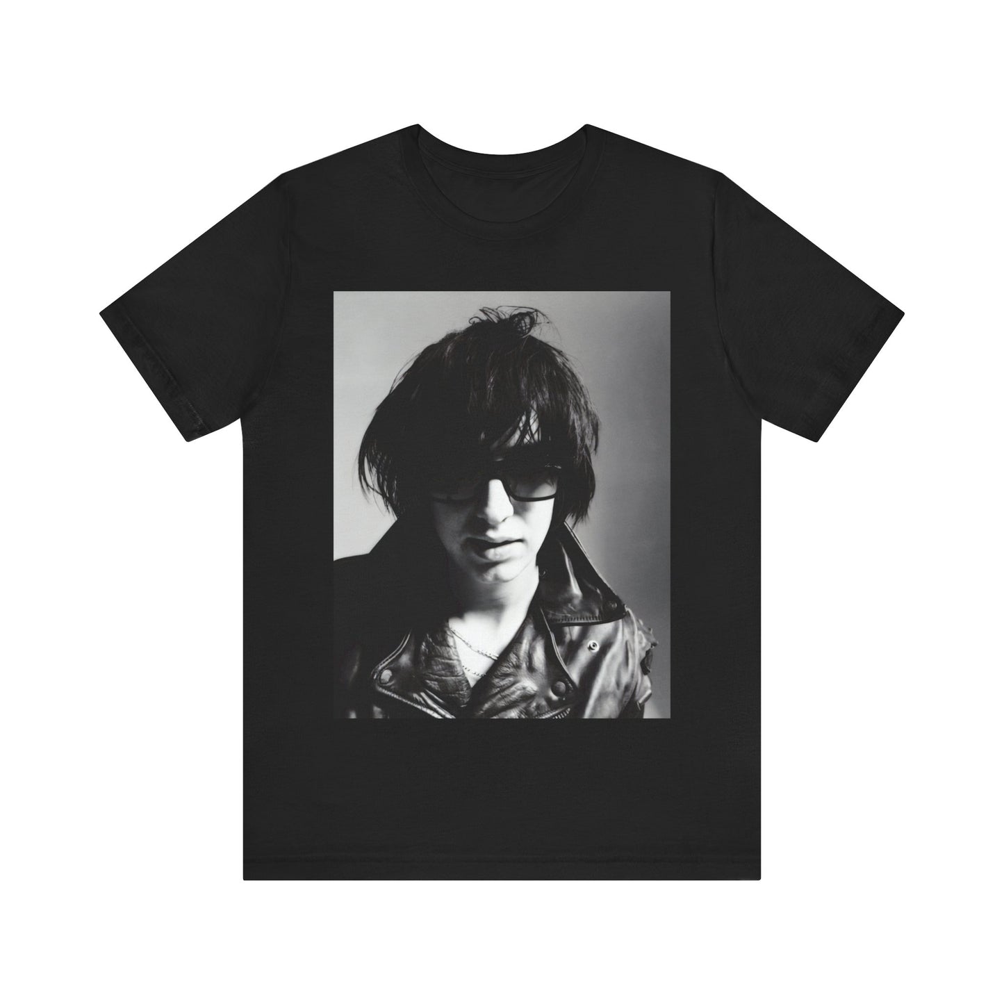 A black graphic t-shirt featuring a graphic related to The Strokes' 'Reptilia' song or era.