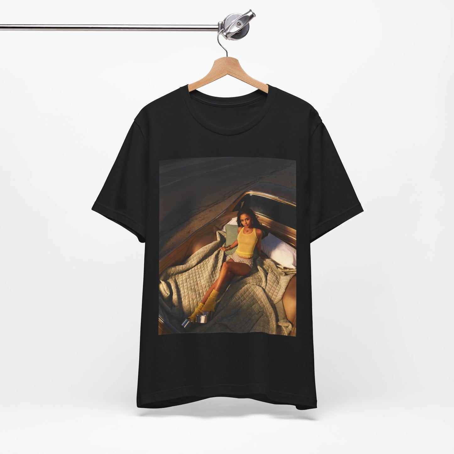 A black graphic t-shirt featuring a graphic of Tyla as an African fashion icon.