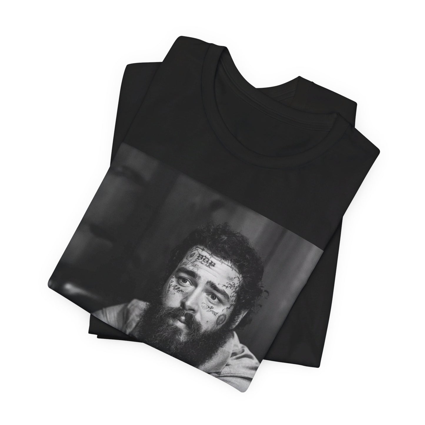 A black graphic t-shirt featuring a black and white, monochrome graphic or photo of Post Malone.