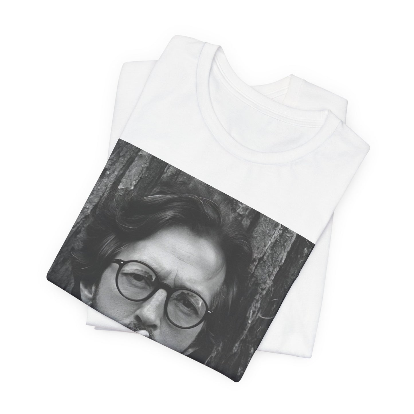 A black graphic t-shirt featuring a graphic related to Eric Clapton's classic Cream era.