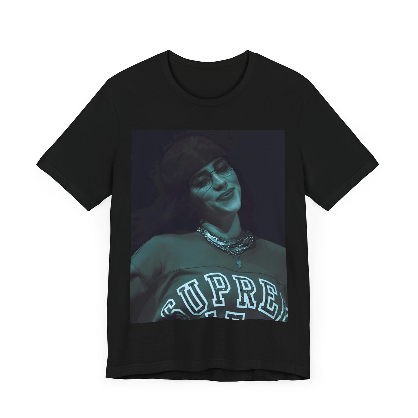 A powerful, close-up portrait of Billie Eilish with a direct and intense stare, printed on a graphic t-shirt.