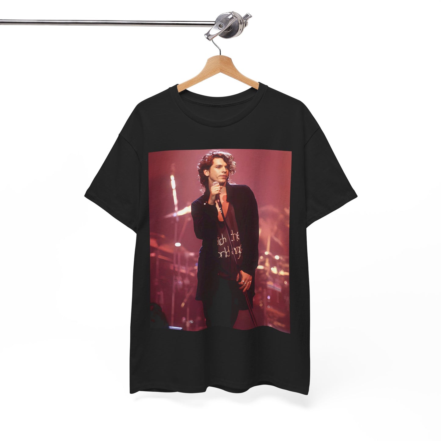 A black graphic t-shirt featuring a graphic related to INXS's 'Never Tear Us Apart' song or era from the 90s.