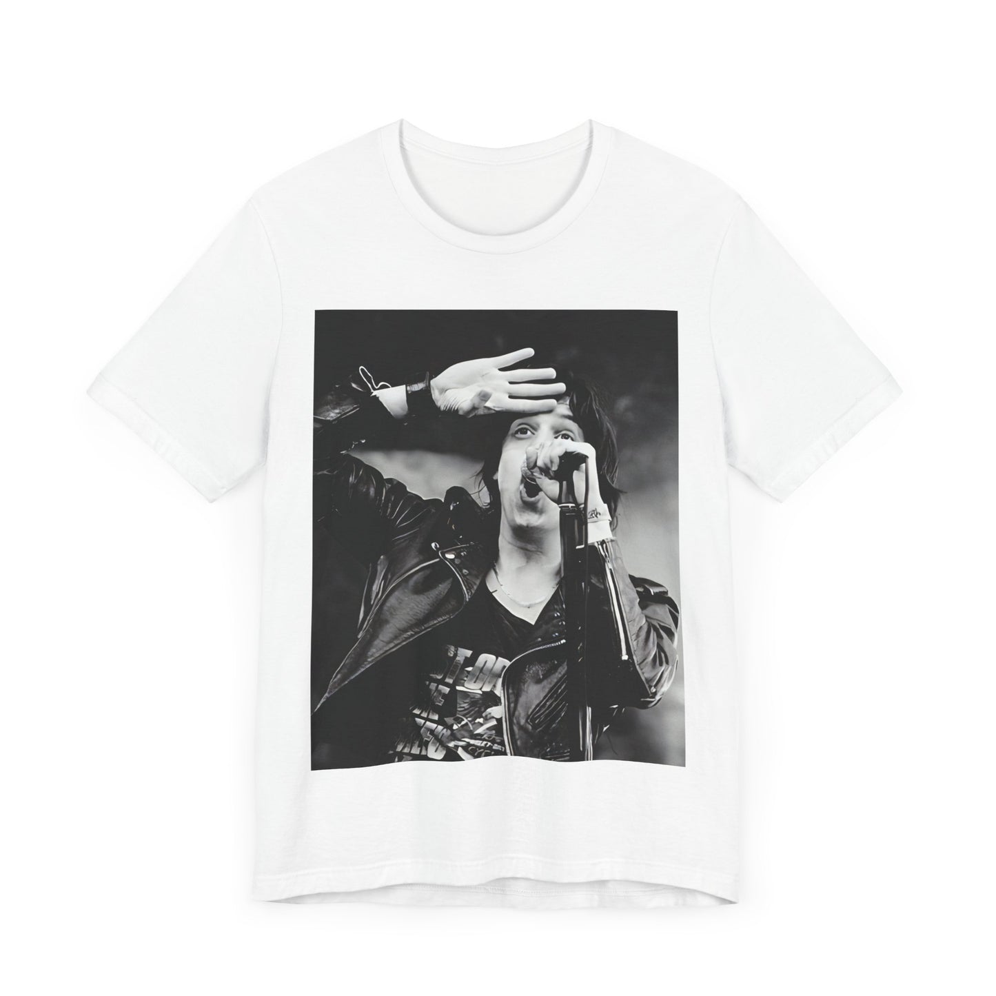 A black graphic t-shirt featuring a black and white portrait photo of The Strokes band.