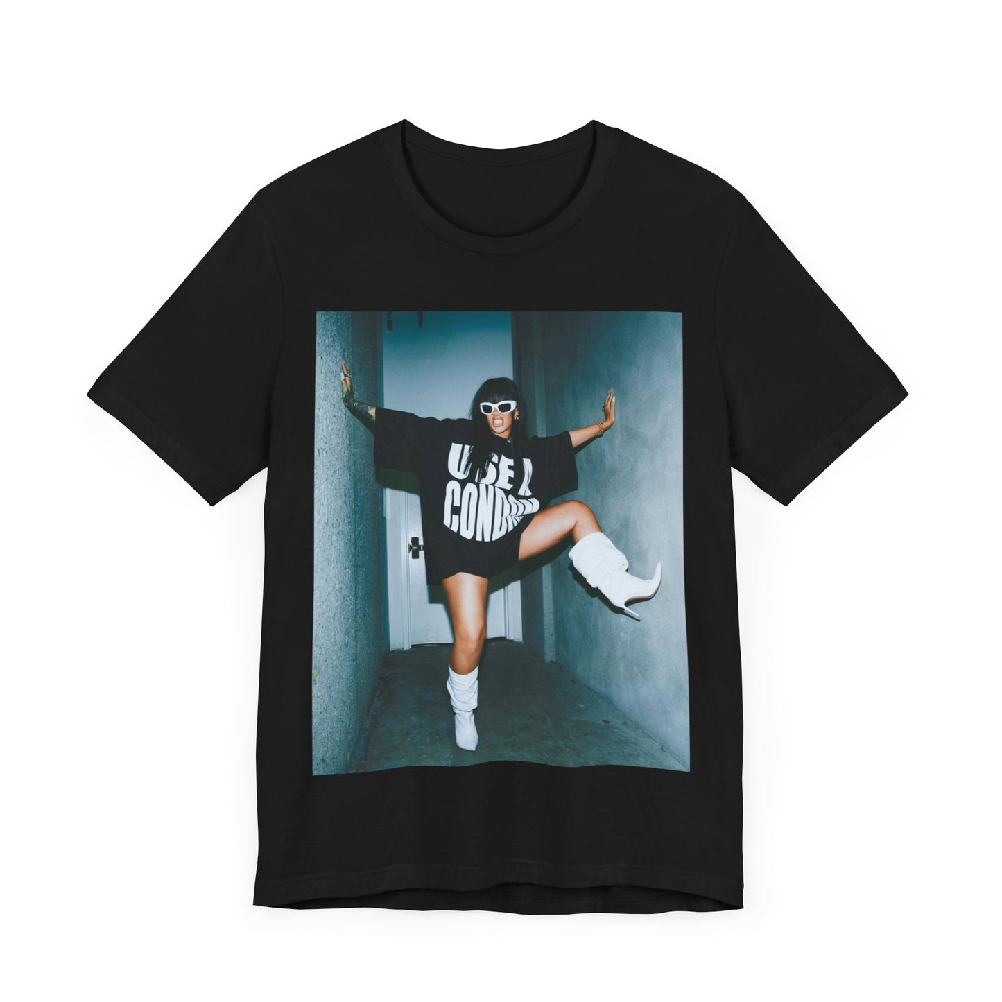 A black graphic t-shirt featuring a modern pop essential graphic of Rihanna.