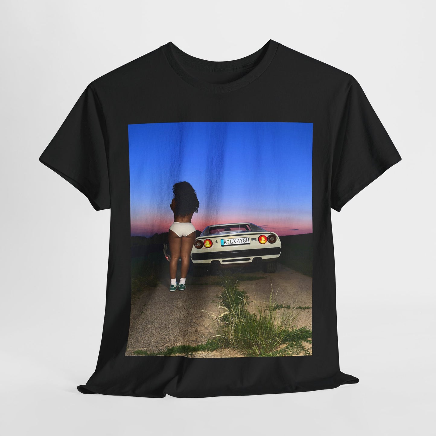 A black graphic t-shirt featuring a vintage alt R&B graphic of SZA.