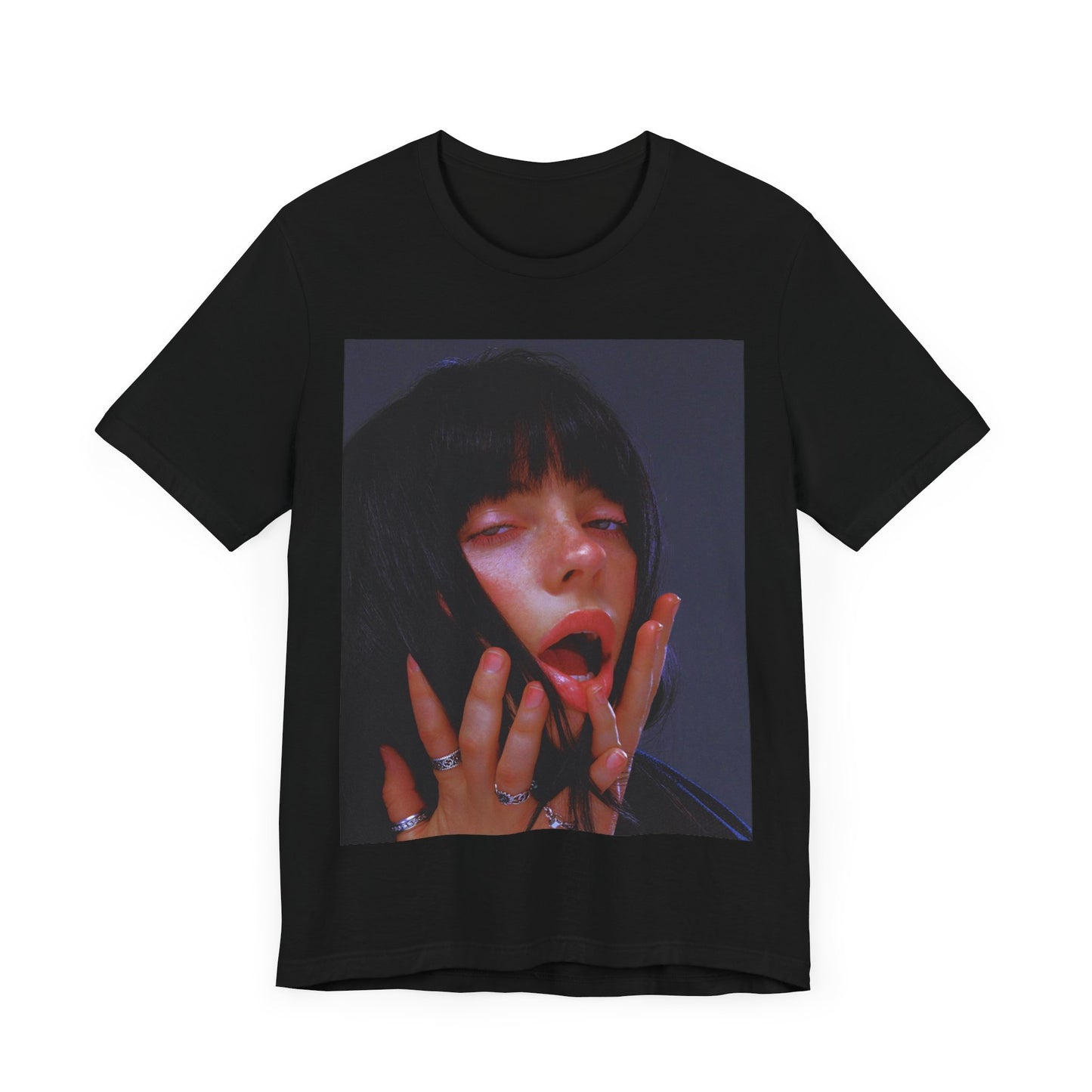 An intense, artistic photo of Billie Eilish with a bloody nose, conveying a sense of raw power, printed on a graphic t-shirt.