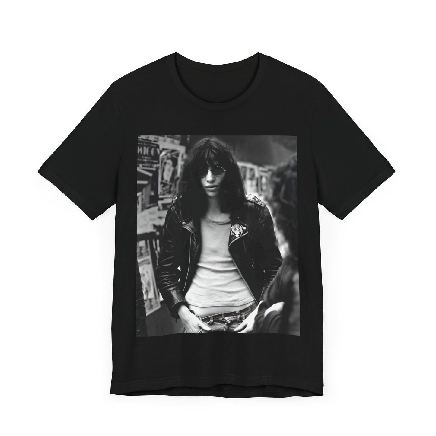 A black graphic t-shirt featuring a 70s black and white photo portrait of Joey Ramone from Ramones.