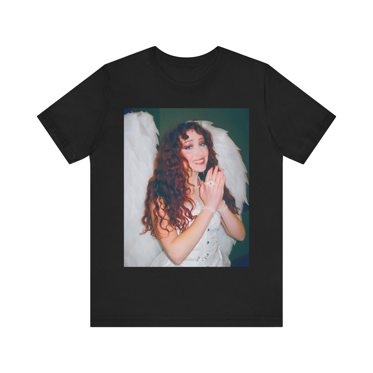 A black graphic t-shirt featuring a graphic of Chappell Roan, possibly with DIY or independent pop elements.