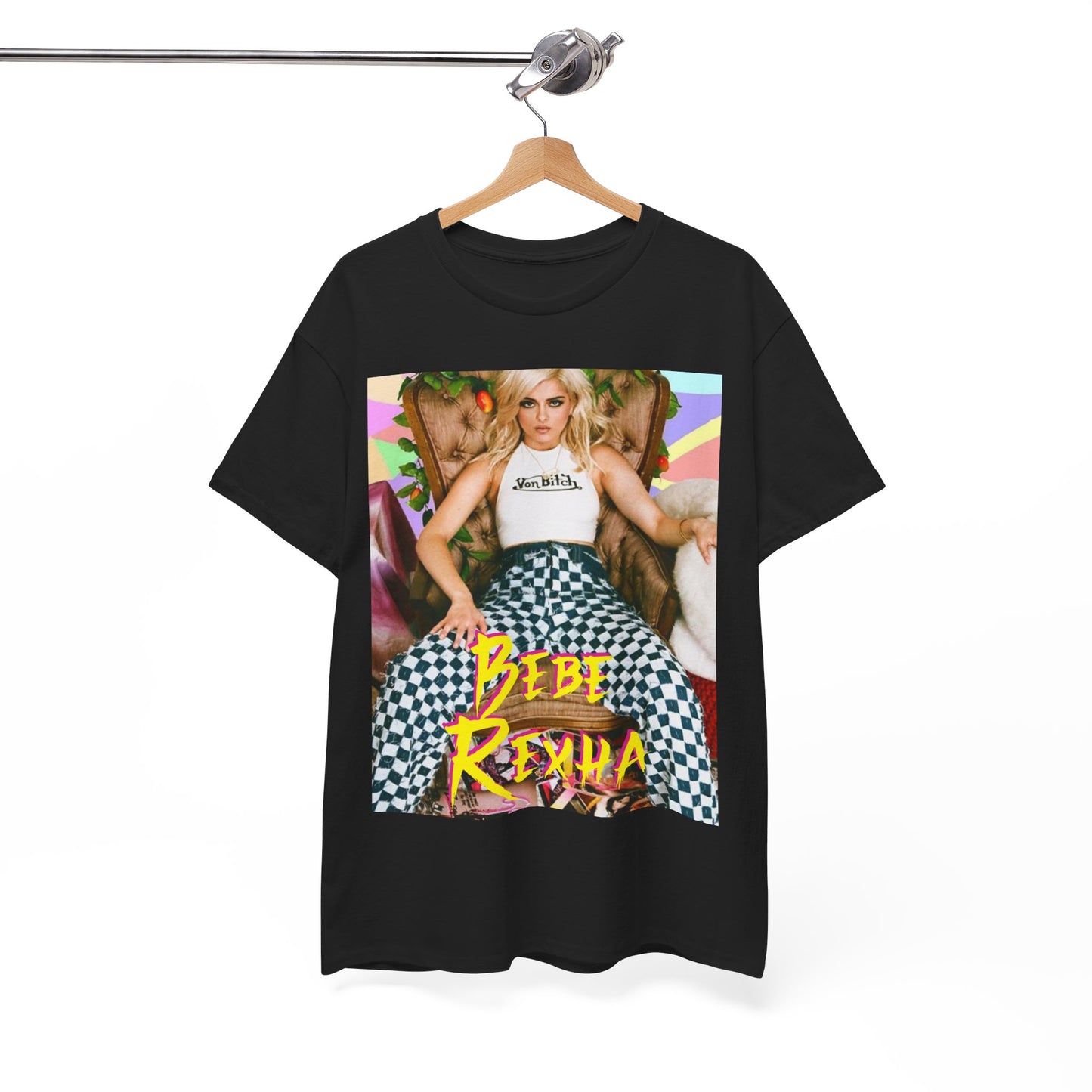 A black graphic t-shirt featuring a bold and dynamic graphic of Bebe Rexha, designed with a pop aesthetic.