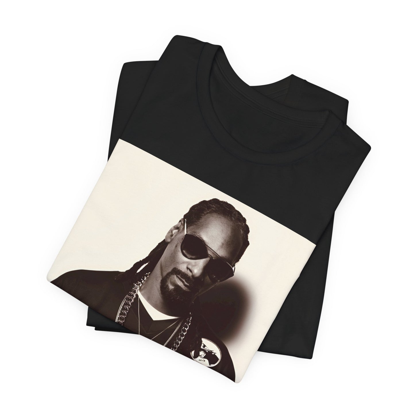 A black graphic t-shirt featuring a black and white, monochrome graphic or photo of Snoop Dogg in an OG style.