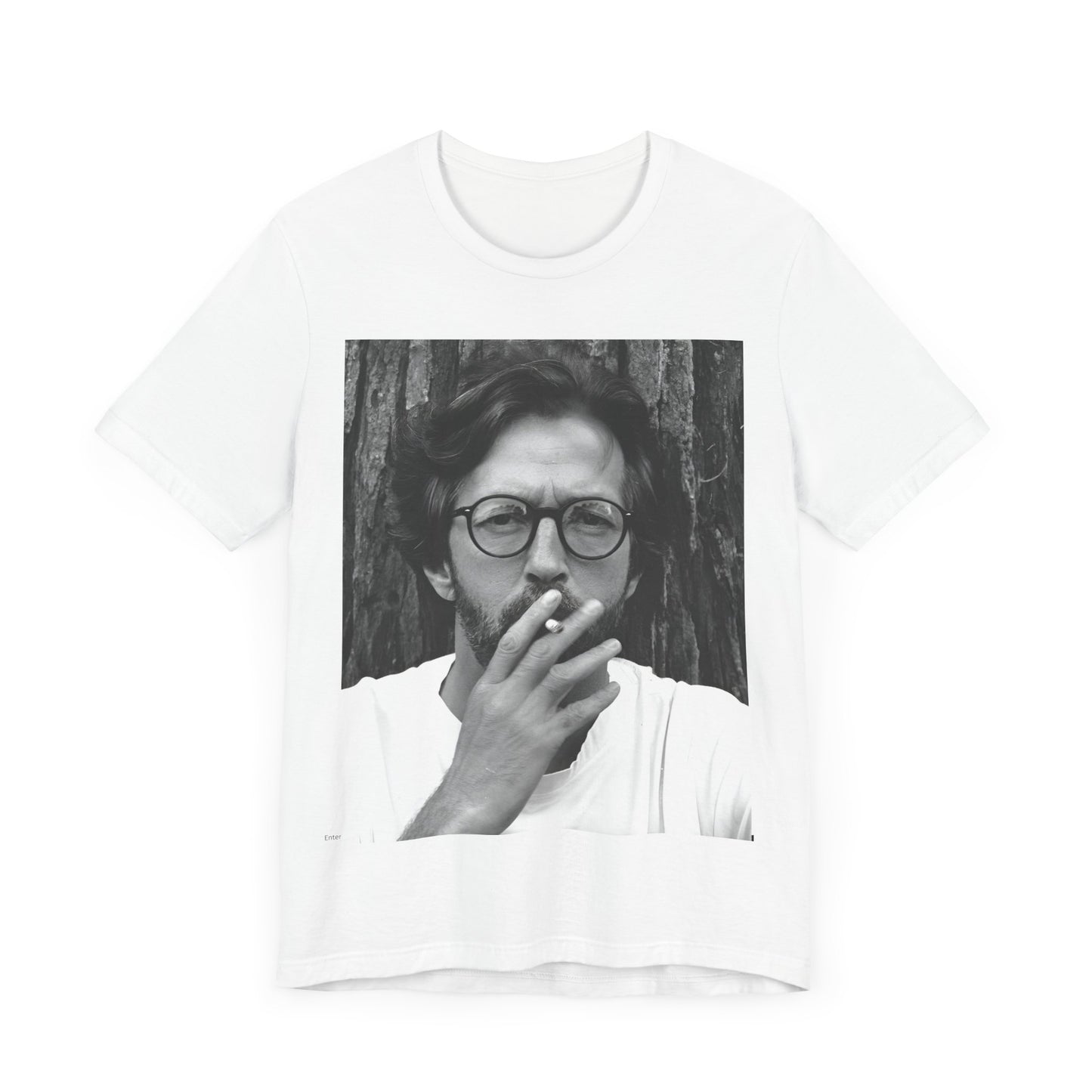 A black graphic t-shirt featuring a graphic related to Eric Clapton's classic Cream era.
