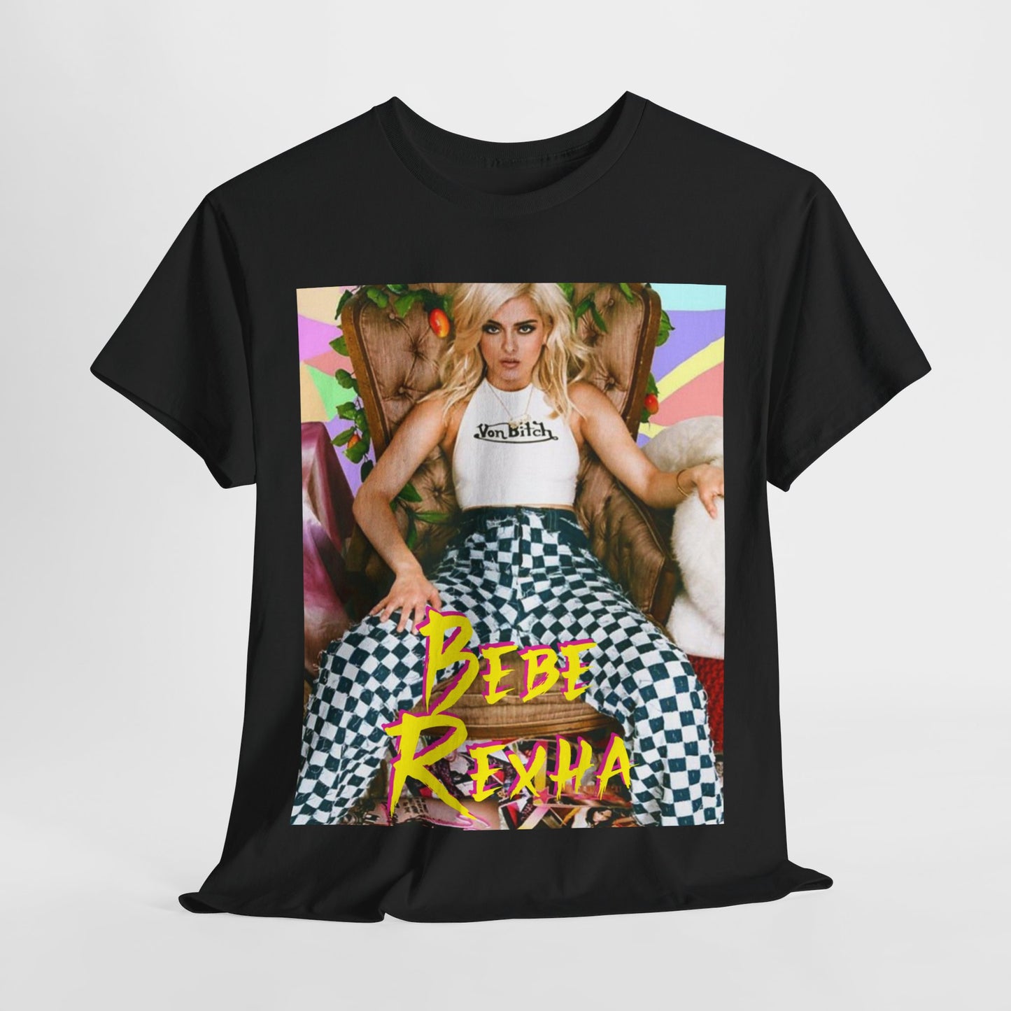 A black graphic t-shirt featuring a bold and dynamic graphic of Bebe Rexha, designed with a pop aesthetic.