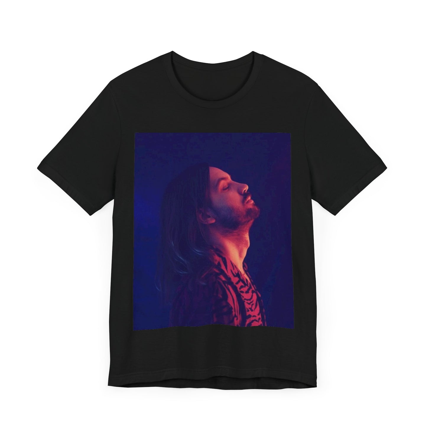 A black graphic t-shirt featuring a retro indie alt-rock graphic of Tame Impala.