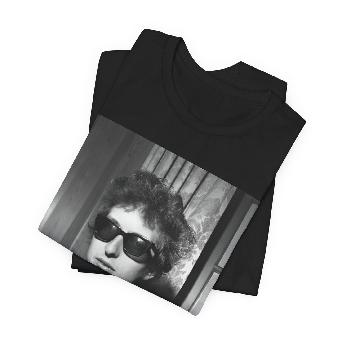 A black graphic t-shirt featuring a graphic related to Bob Dylan's 'The Freewheelin' album era.