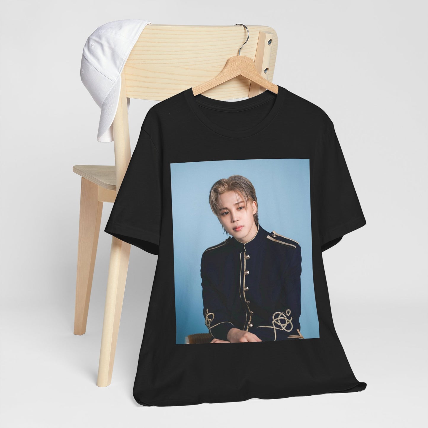 A black graphic t-shirt featuring a graphic related to Jimin's 'FACE' album era.