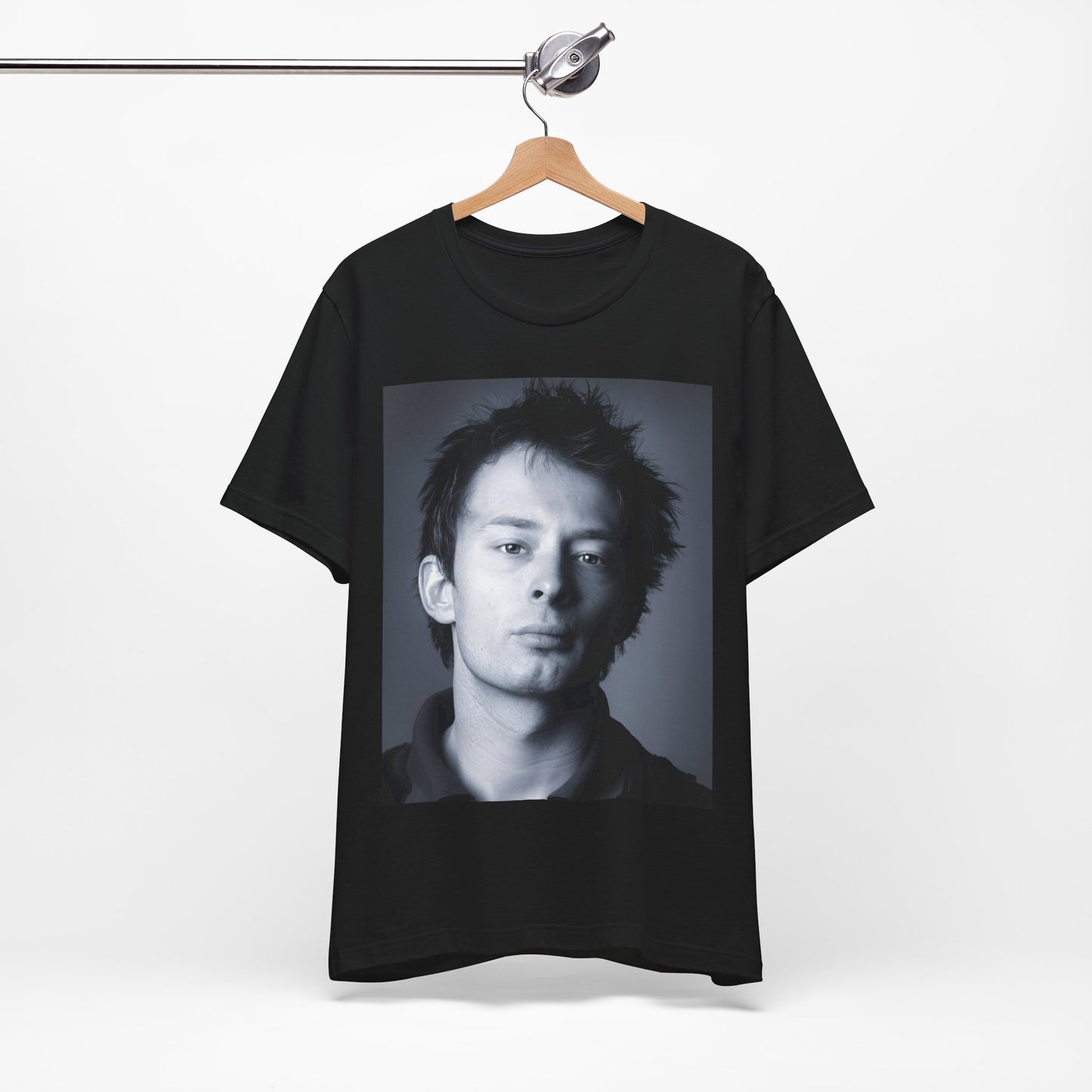 A black graphic t-shirt featuring an enigmatic graphic of Thom Yorke from Radiohead as a frontman.