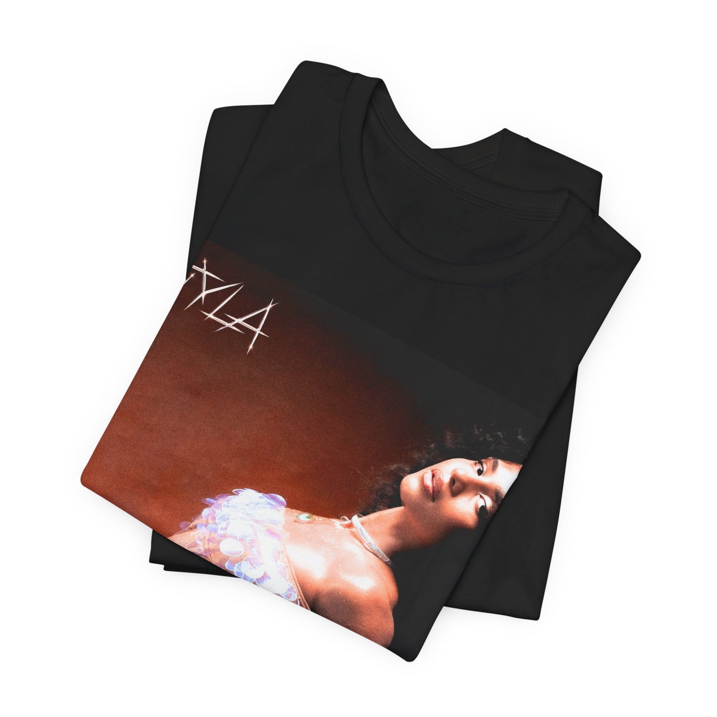 A black graphic t-shirt featuring a cultural fusion vibes graphic of Tyla.