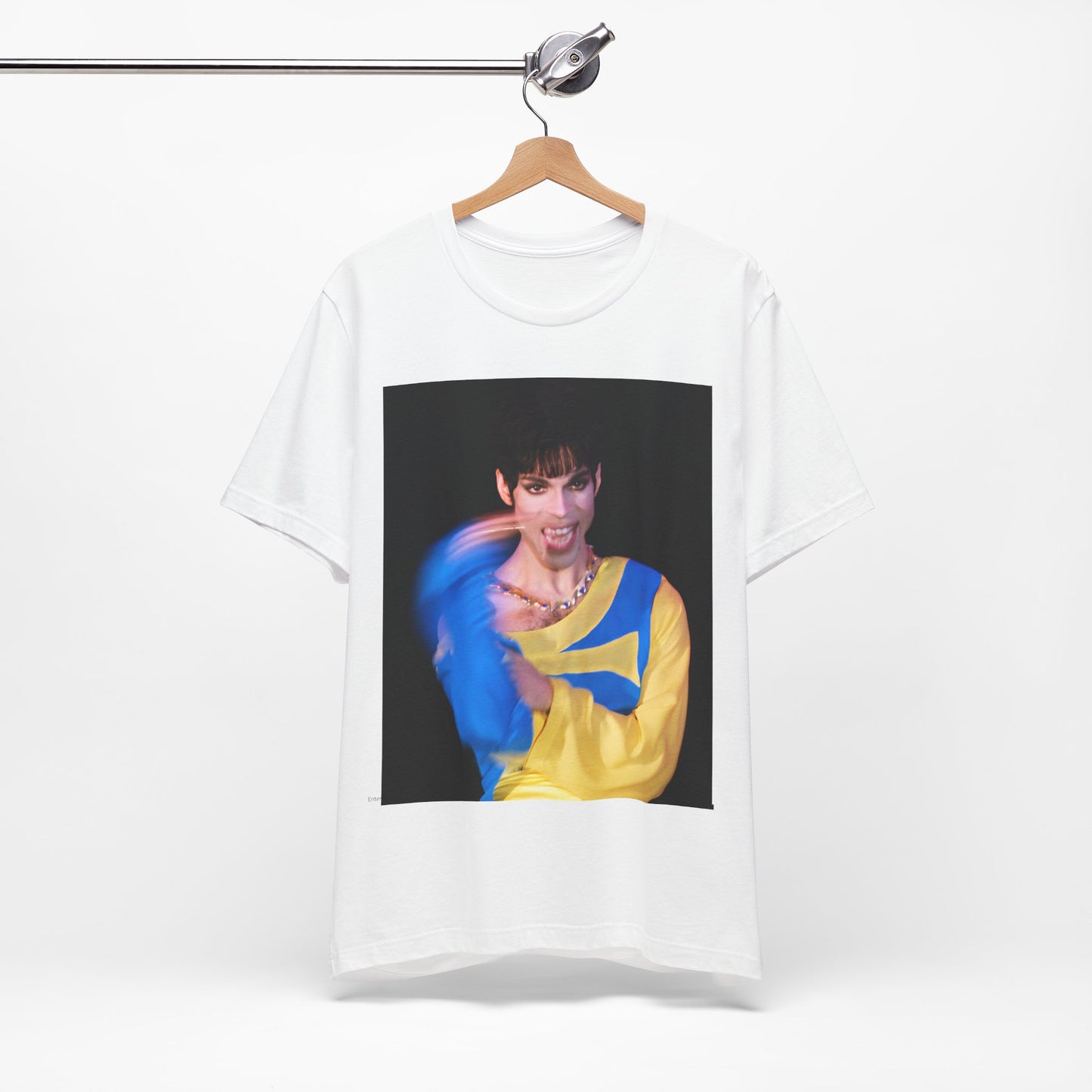 A black graphic t-shirt featuring a graphic related to Prince's 'When Doves Cry' song or era.
