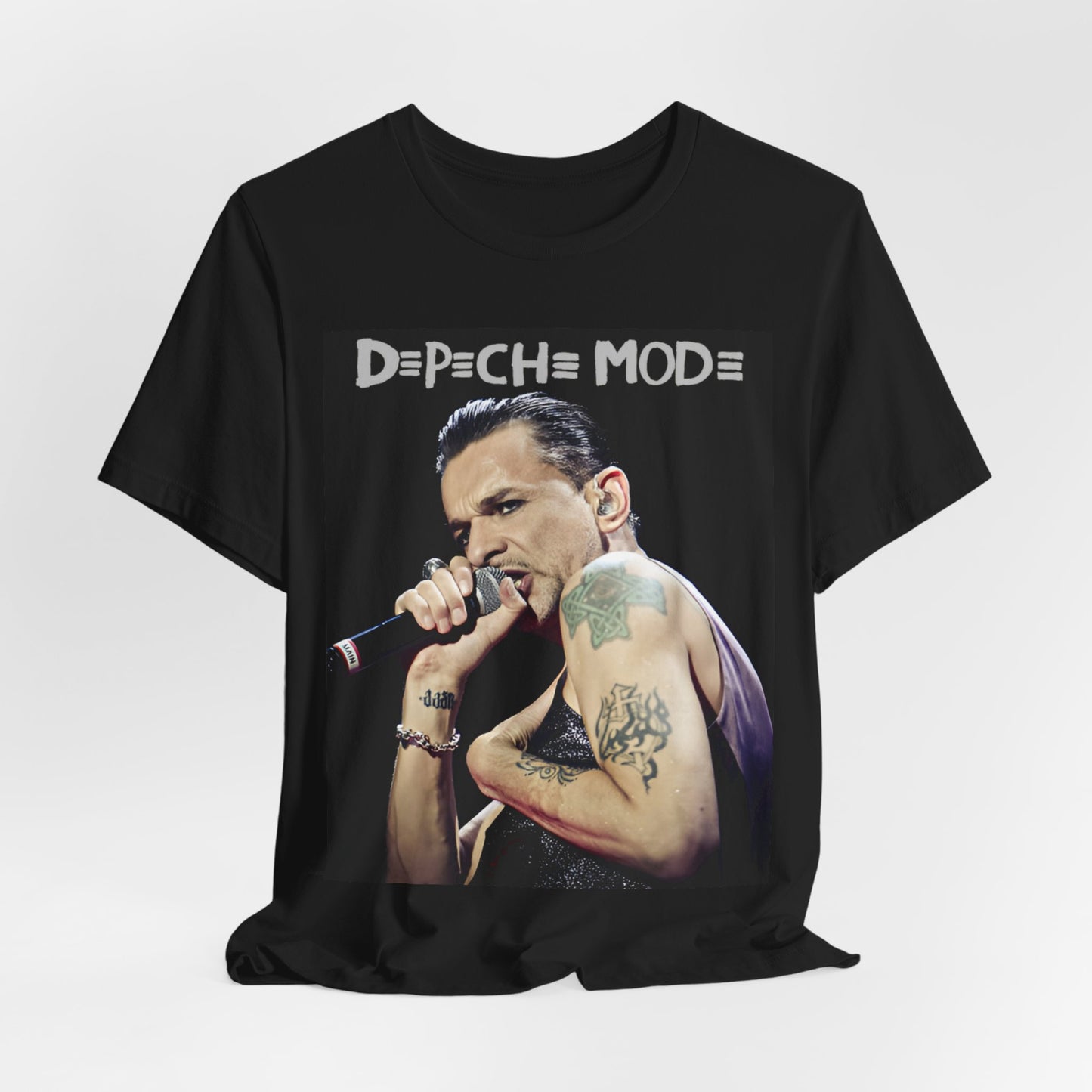A black graphic t-shirt featuring a graphic of Dave Gahan from Depeche Mode, emphasizing his dynamic stage presence.