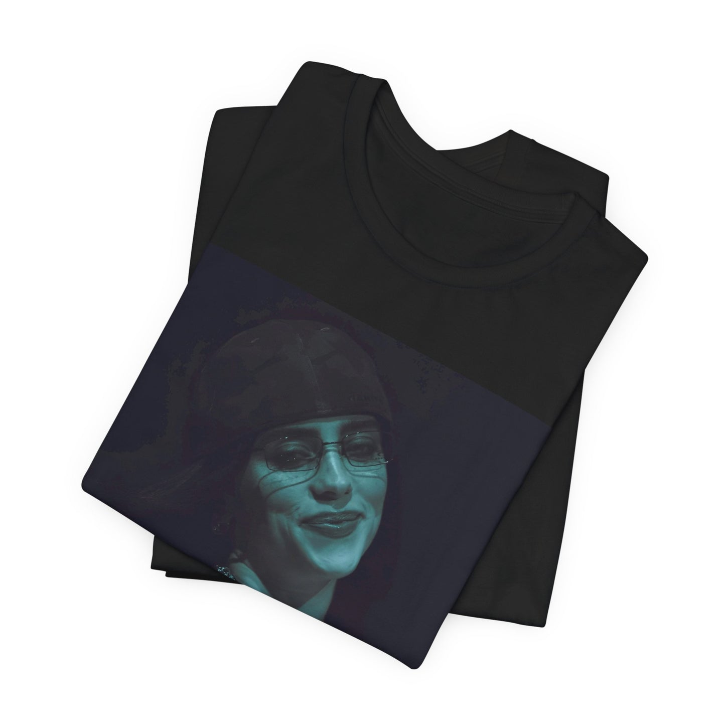 A powerful, close-up portrait of Billie Eilish with a direct and intense stare, printed on a graphic t-shirt.