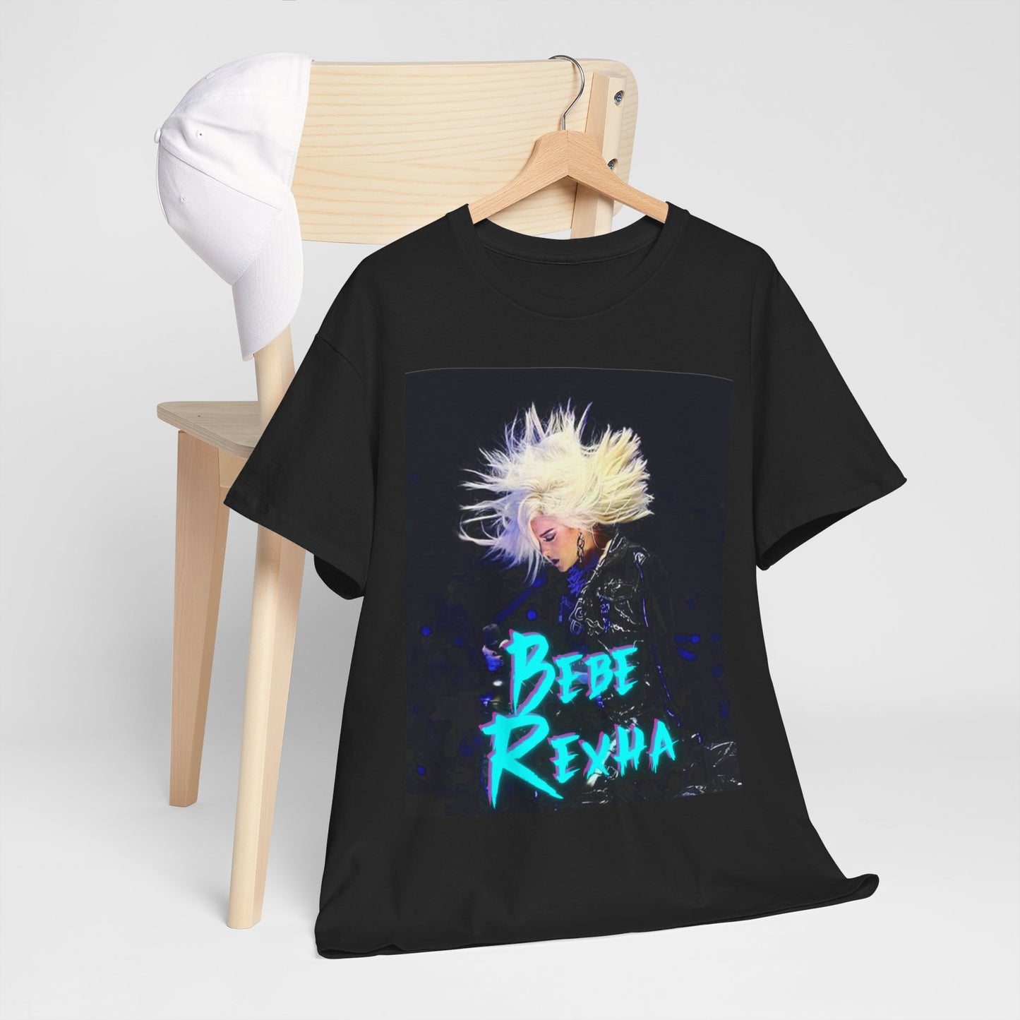 A black graphic t-shirt featuring a retro-style graphic of Bebe Rexha in a posed, aesthetic manner.