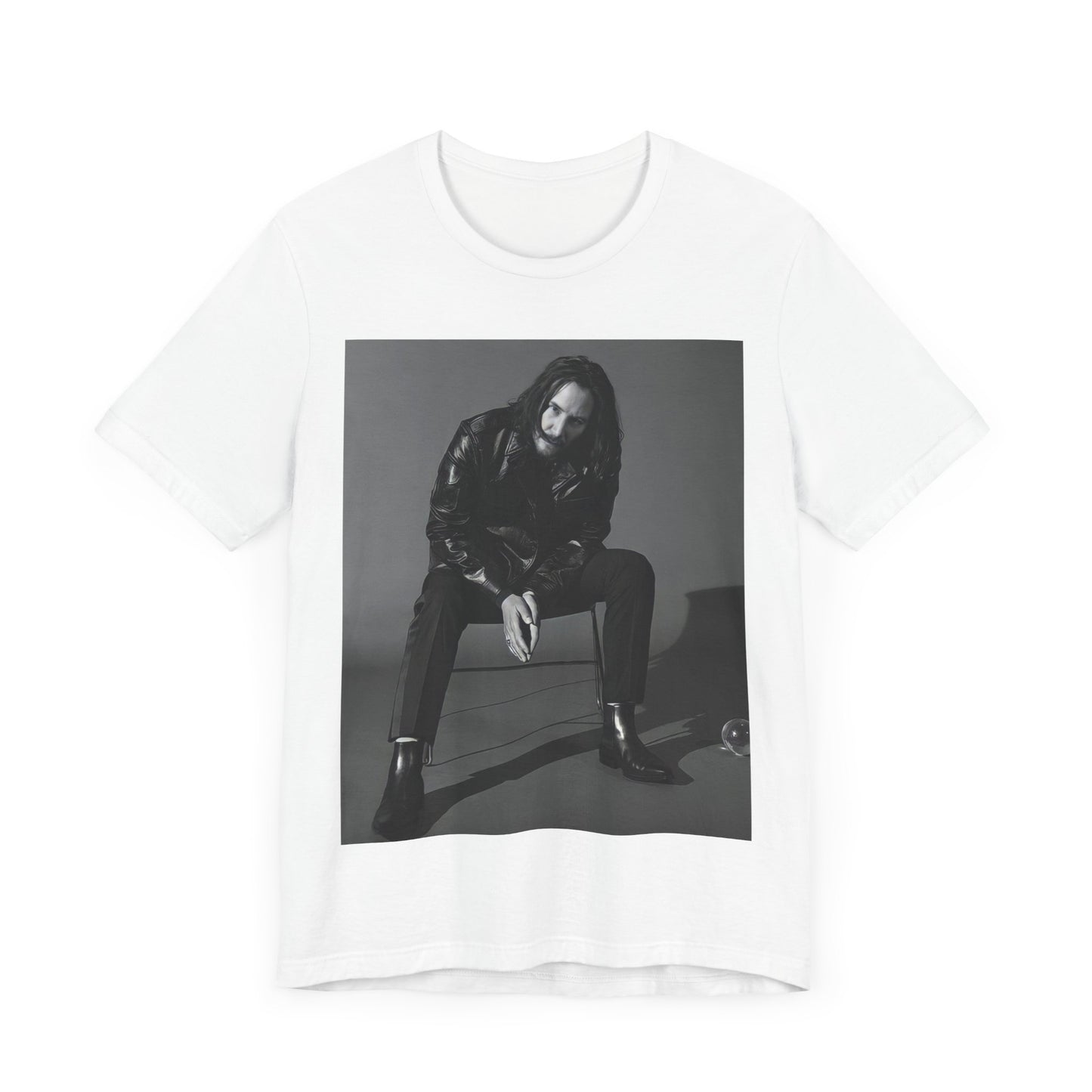 A black graphic t-shirt featuring a graphic of Keanu Reeves as John Wick.