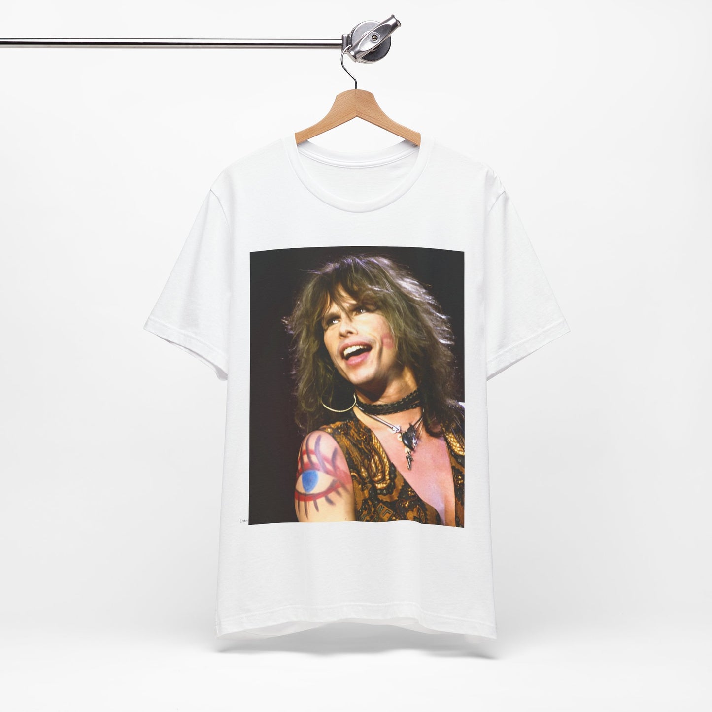 A black graphic t-shirt featuring a design related to Aerosmith's 'Nine Lives' tour from the 1990s, likely incorporating album art elements or band visuals from that era.