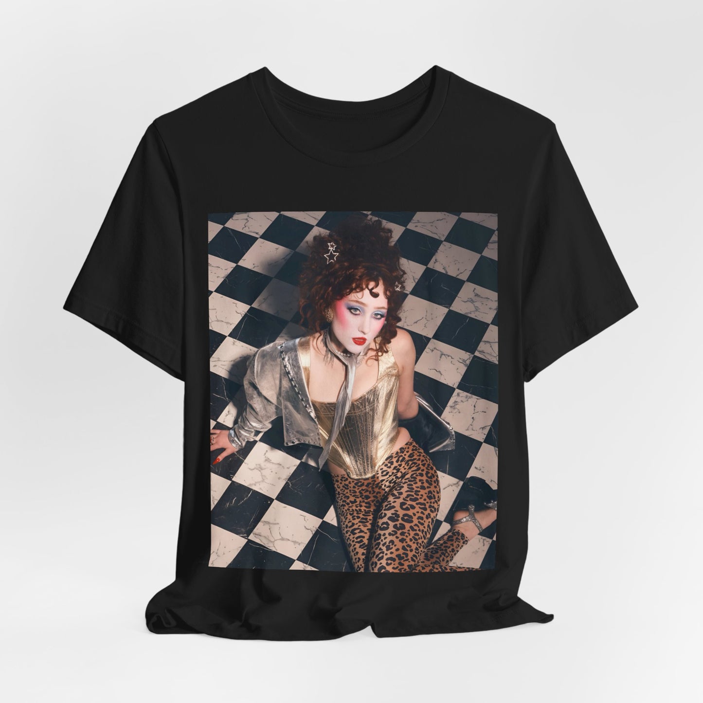 A black graphic t-shirt featuring a graphic of Chappell Roan, evoking "Naked in Manhattan" vibes.