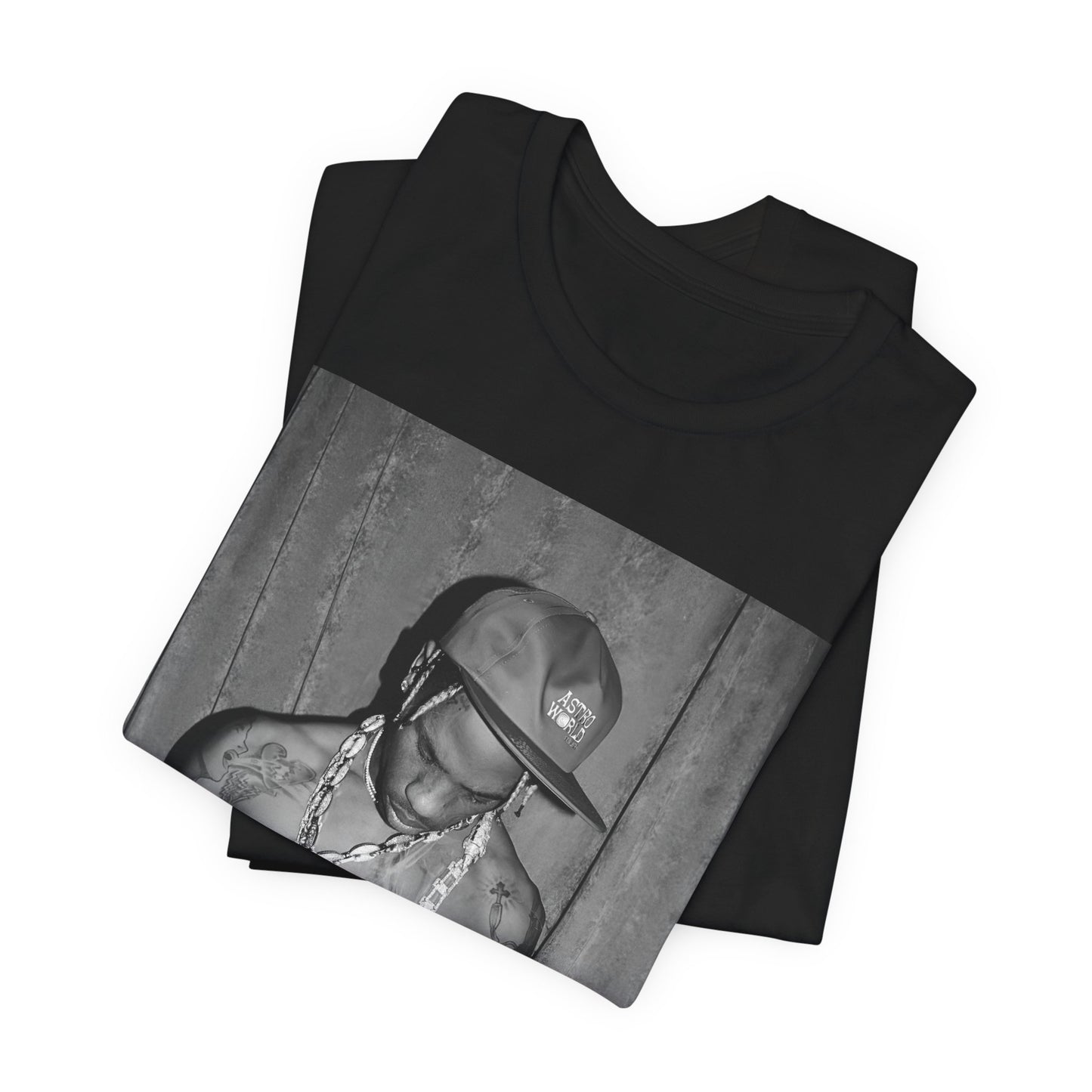 A black graphic t-shirt featuring a graphic of Travis Scott as the Houston rap king.