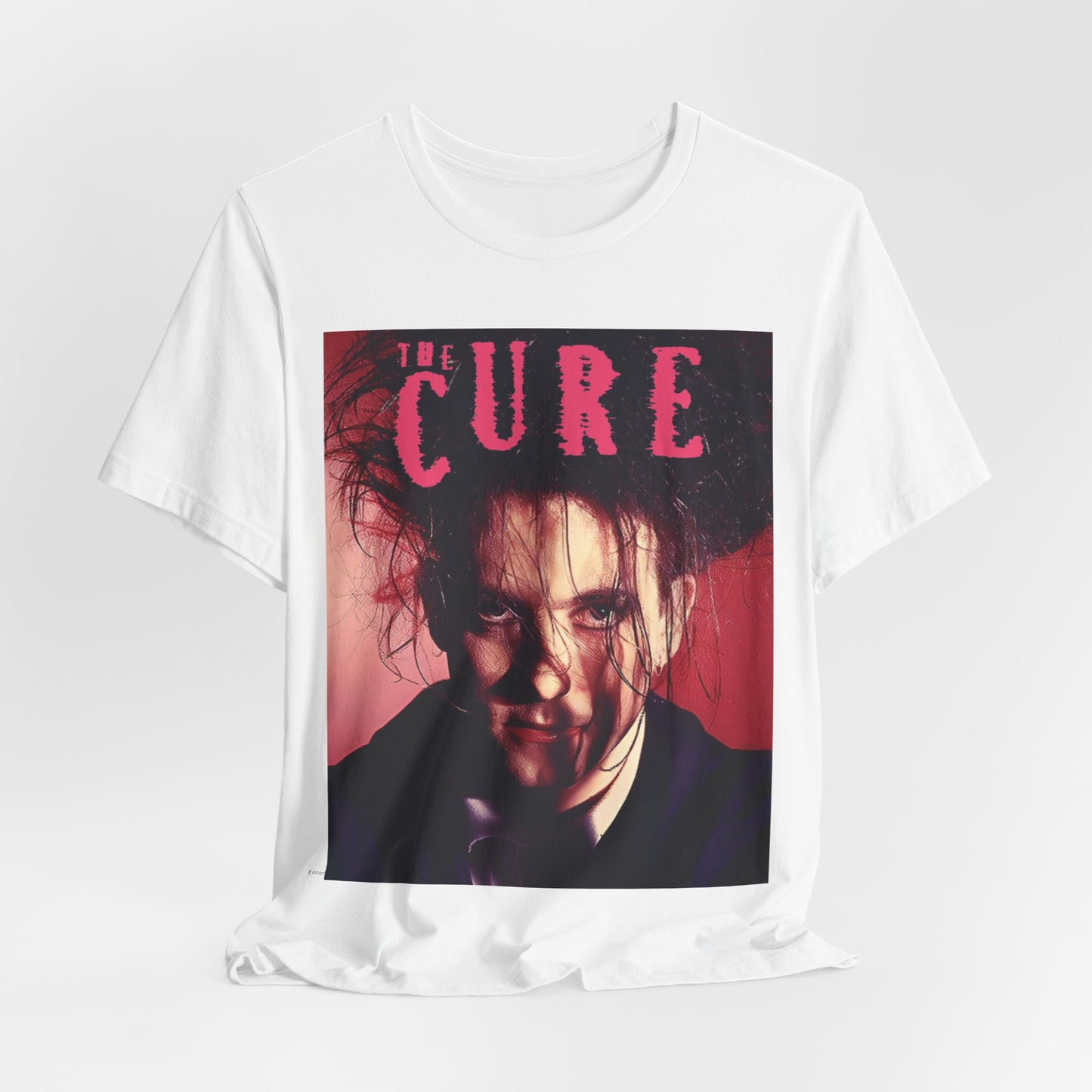 A black graphic t-shirt featuring a vintage graphic related to The Cure's 'Just Like Heaven' song or era.
