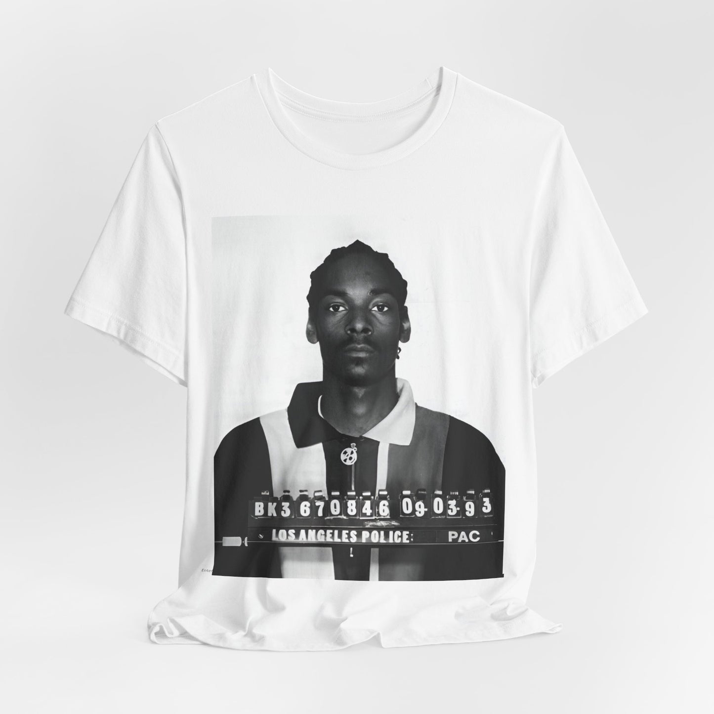 A black graphic t-shirt featuring a graphic of Snoop Dogg's mug shot.