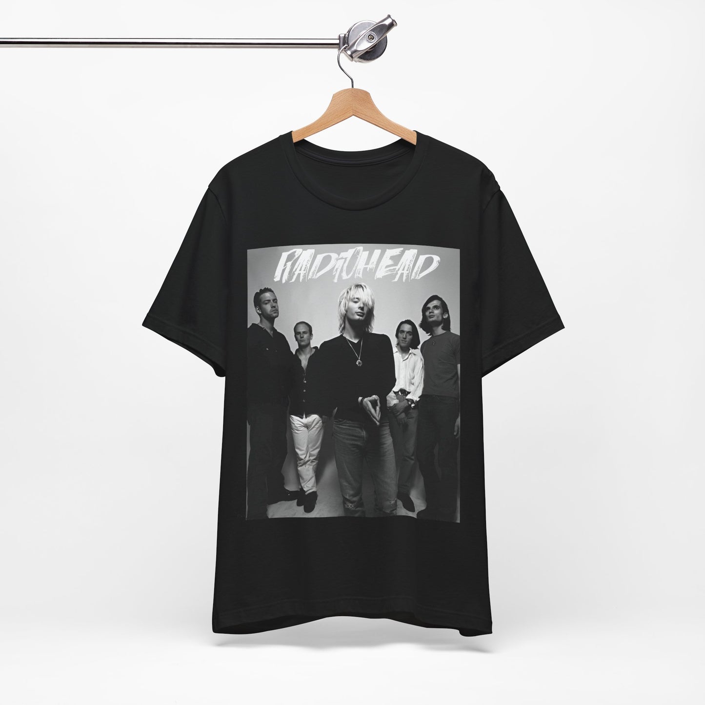 A black graphic t-shirt featuring a retro graphic related to Radiohead's 'OK Computer' album era.