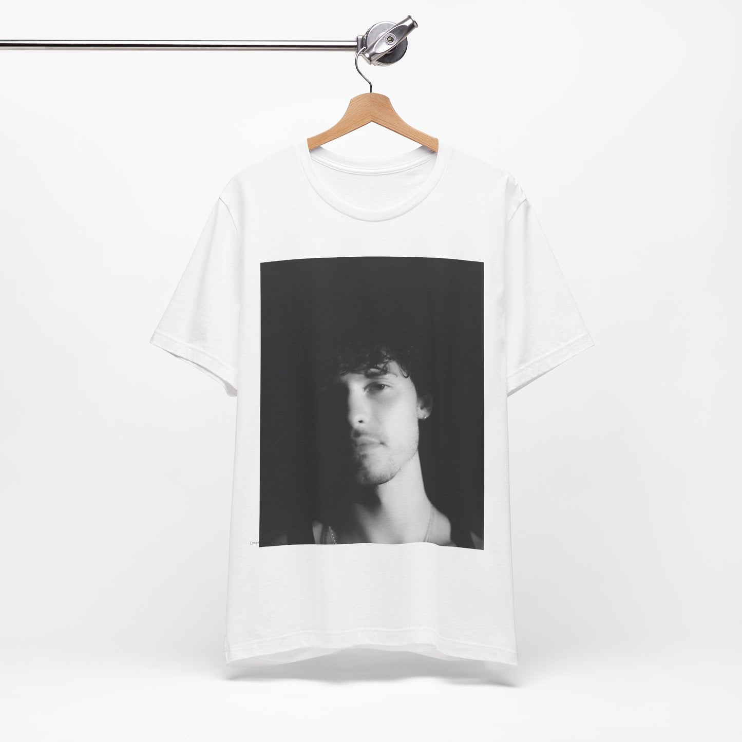 A black graphic t-shirt featuring a black and white portrait photo of Shawn Mendes.