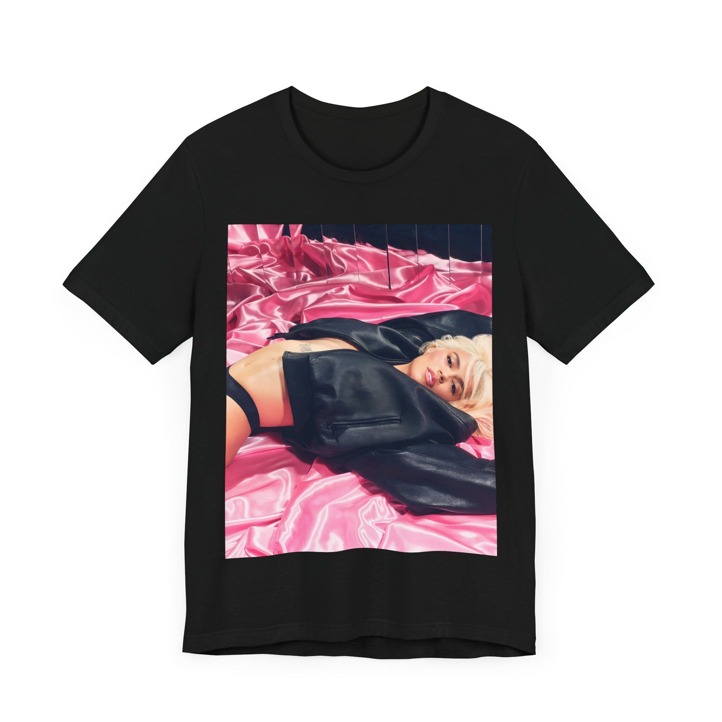 A black graphic t-shirt featuring a vintage aesthetic graphic related to Karol G's 'Tusa' era.