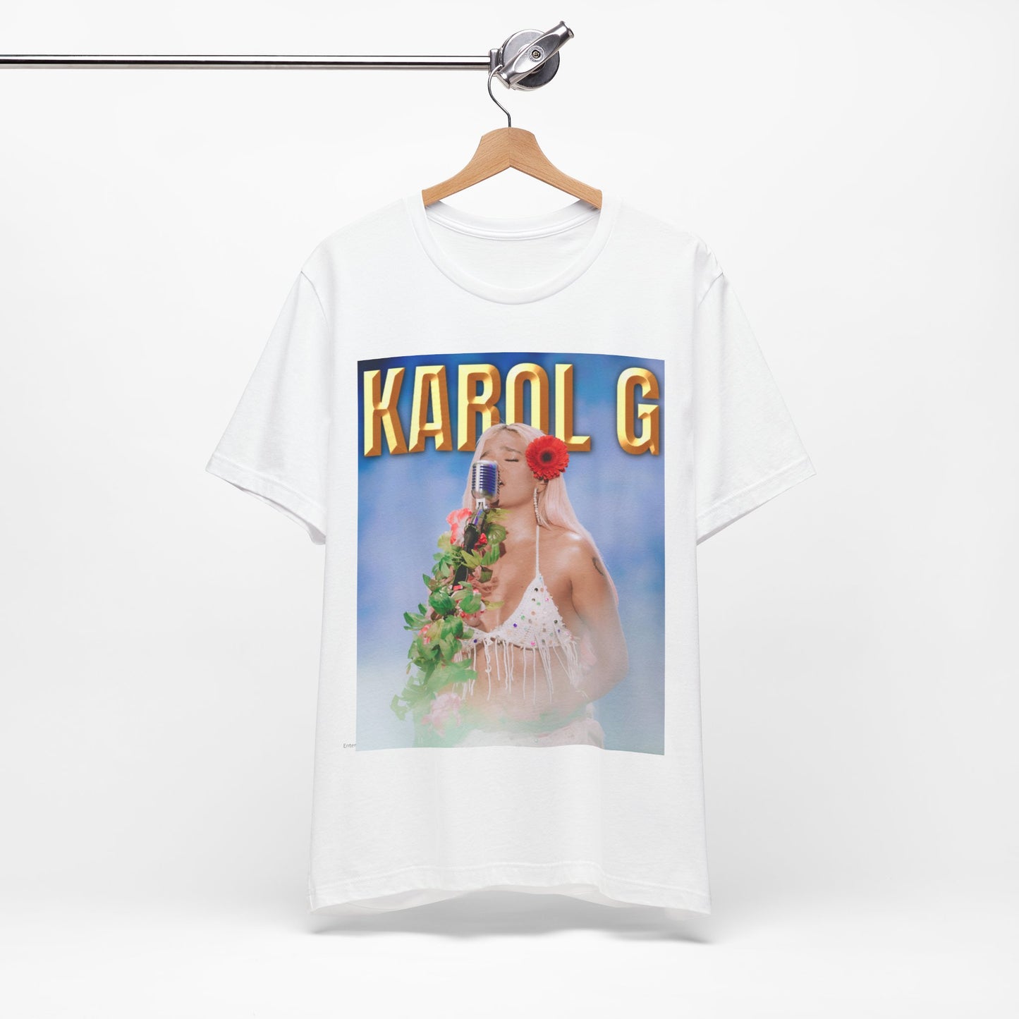 A black graphic t-shirt featuring a graphic of Karol G as a classic Latin pop queen.