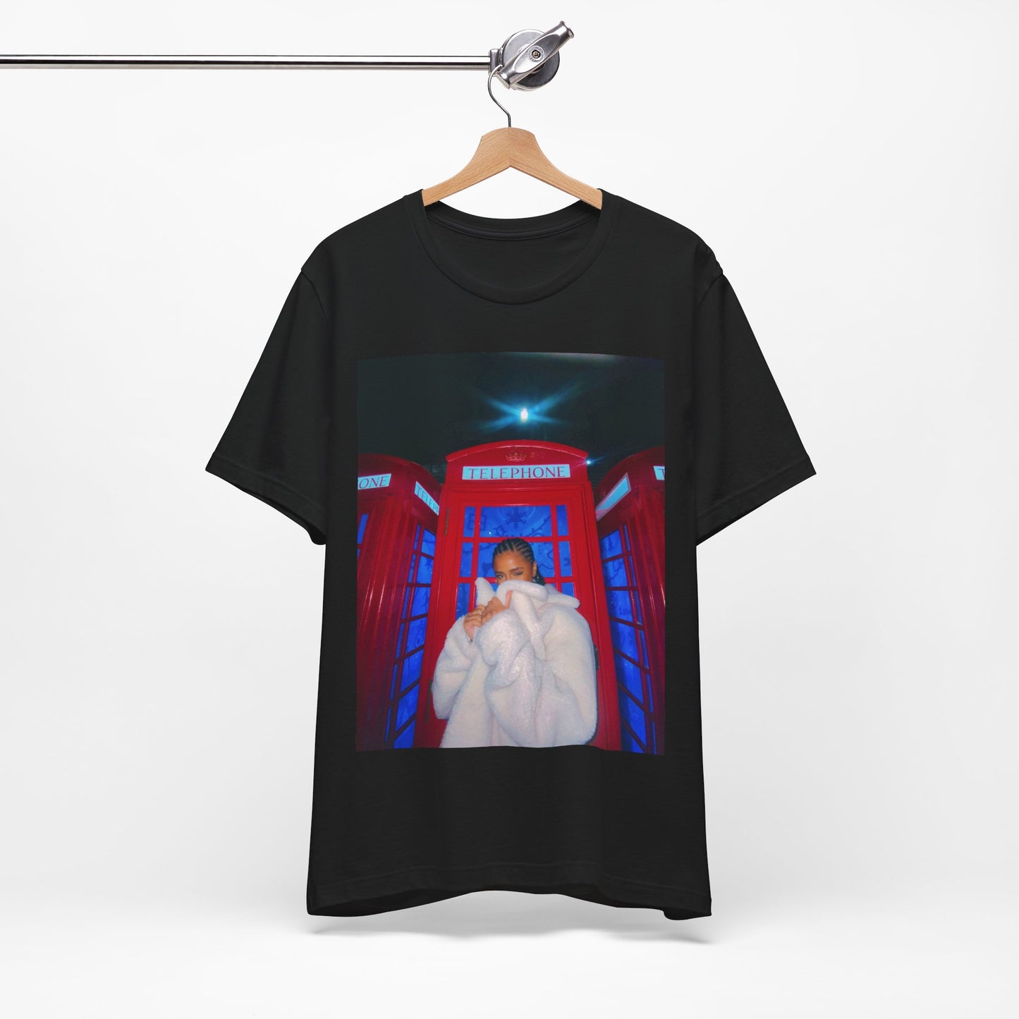 A black graphic t-shirt featuring a rhythmic dance pop graphic of Tyla.