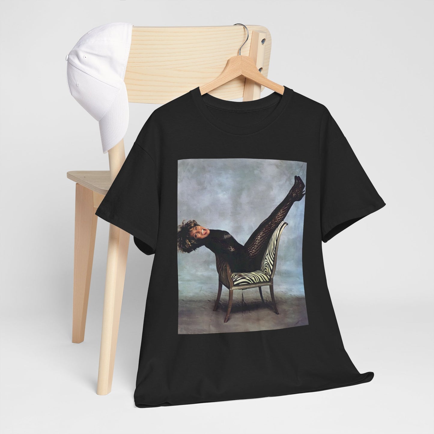 A black graphic t-shirt featuring a bold rock superstar graphic of Tina Turner.