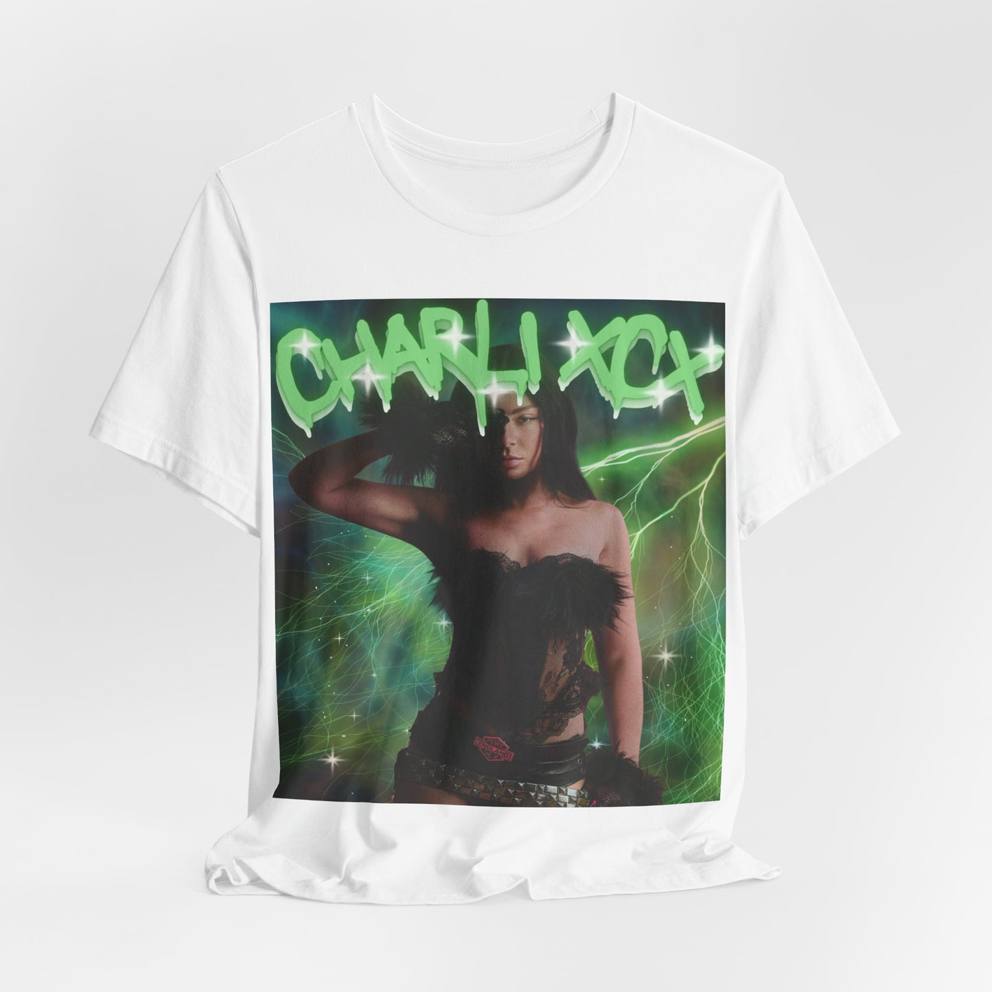 A black graphic t-shirt featuring a retro green neon graphic of Charli XCX's signature.