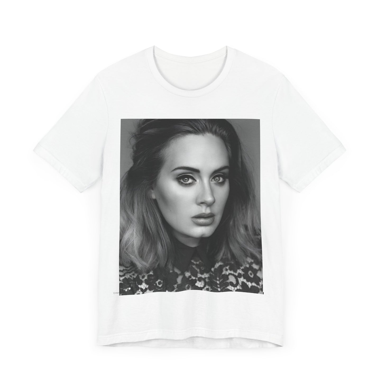 A black graphic t-shirt featuring a classic black and white, monochrome portrait of Adele, showing her with a serene or thoughtful expression.
