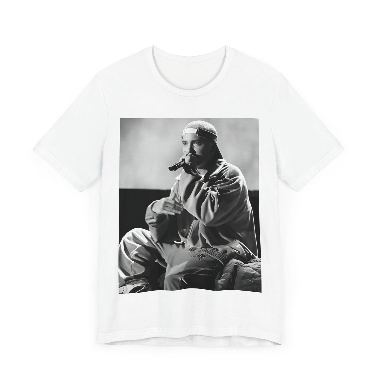 A black graphic t-shirt featuring a black and white graphic of Eminem as a 'Rap Messiah'.