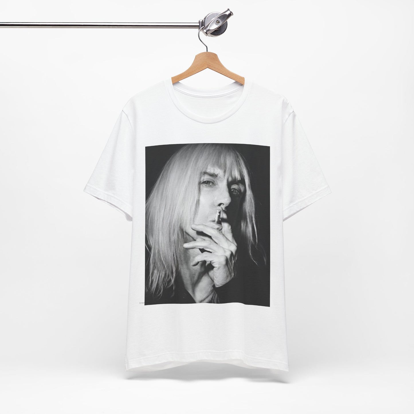 A black graphic t-shirt featuring a black and white graphic or photo of Iggy Pop holding a cigar.